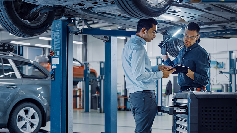 Vehicle being inspected in a repair workshop