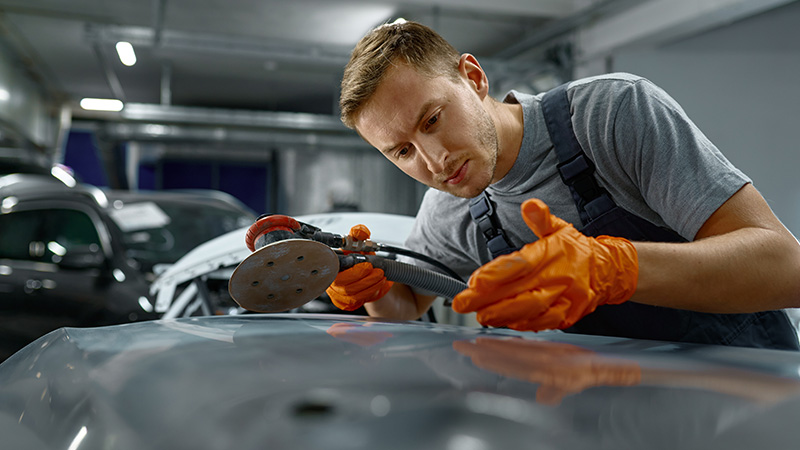 Qualified technician working in an approved repair centre